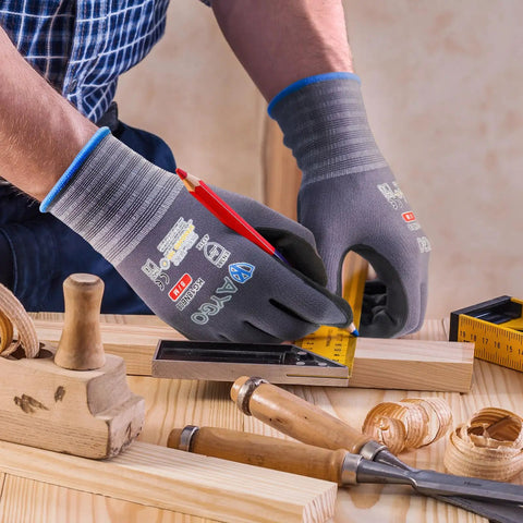 Person wearing MicroFoam Nitrile Coated Work Gloves With 25 Percent Thinner Coating 3 Pairs Seamless Knit Nylon handling wood in workshop