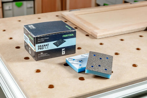Granat Pro Medium Profile Sanding Sheets 3x4 Inch (80x133 mm) 10 Pack on workbench; foam-backed for contours, woodwork.