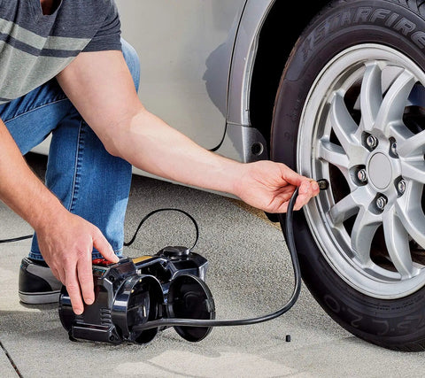 Heavy Duty Electric Floor Jack And Quick Fill Tire Inflator Pump Combo For Fast Flat Fixes in use, inflating car tire.