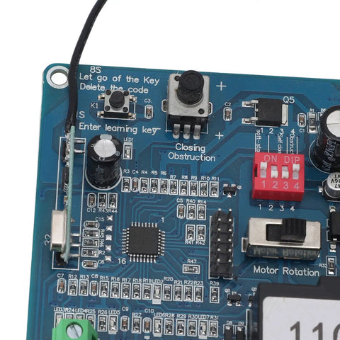 Close-up of Sliding Gate Opener Circuit Board With Remote Control Thirty Meter Range Advanced Microcomputer Control 110V Power.