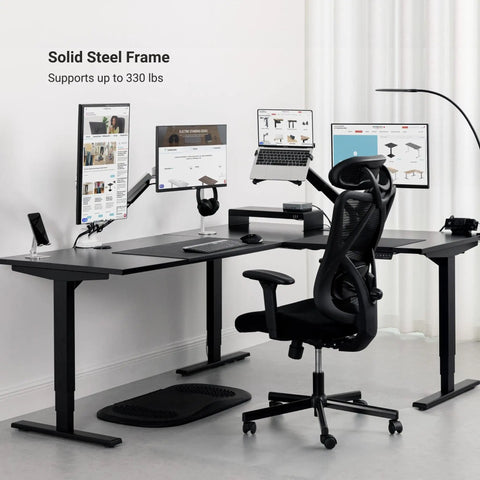 Super Spacious L Shaped Electric Standing Desk With Smooth Silent Lift And Built Tough White Frame Design For Triple Screen Setups and serious home office game changer setup with solid steel frame and monitors.