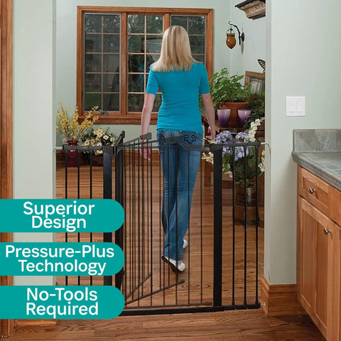 Woman installing Tall And Wide Auto Close Baby Gate With Magnetic Lock Technology, Pressure Mounted for Quick Easy Peasy Install
