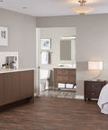 Modern bathroom with Parma Single Handle Lavatory Faucet With Metal Touch Down Drain, visible from bedroom view.