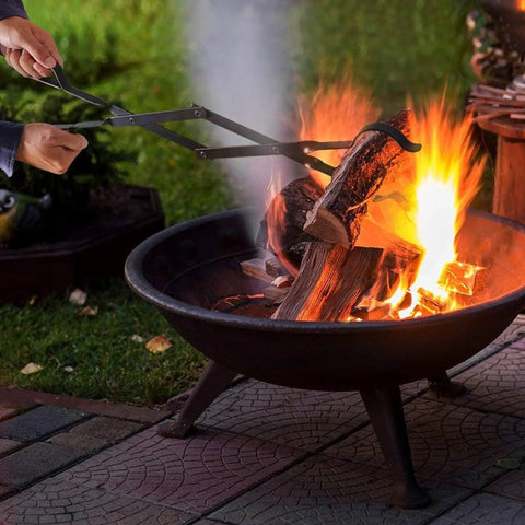Using 26 inch fireplace tongs to adjust logs in fire pit; Beefy 32 Inch Fire Pit Poker And 26 Inch Fireplace Tongs Tool Set Log Grabber Rust Resistant Campfire Tools For Indoor Outdoor Use Ideal For Backyards Campsites And Solo Stove Accessories.