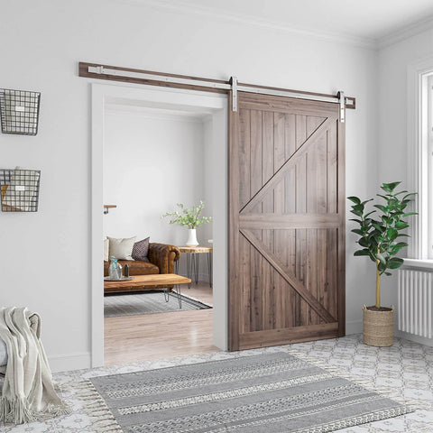 Interior view showing 8 Feet Brushed Nickel Barn Door Hardware Kit for 42 to 48 inch wide panels, installed in a living room doorway.