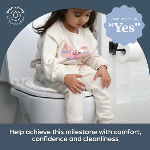 Toddler Non Slip Potty Training Seat, Ultra Soft Cushion Cover With Quick Wipe Sanitizing, Universal Fit Adapters For Round Or Elongated Toilets on toilet with child.