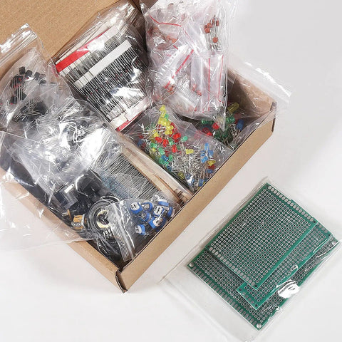 Open box showing Massive 1900Pcs Electronics Component Kit Bundle With LED Diodes Resistors Capacitors Transistors DC Jacks PCBs