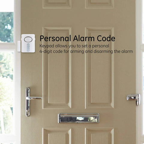 Door with Wireless Alarm With Programmable Keypad For Home Security Four Digit Code To Arm Or Disarm, installed near handle.