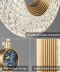 Close-up of Lit Gold Brushed Modern Pendant Lights for Kitchen Island with acrylic lampshade and gold plated aluminum design.