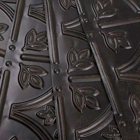 Close-up of embossed design on Tin Wall Tiles 24x24 Nail Up Black 5 Pack for Backsplash Ceiling and Stair Risers, 0.01 Inch Thick Metal Panels.