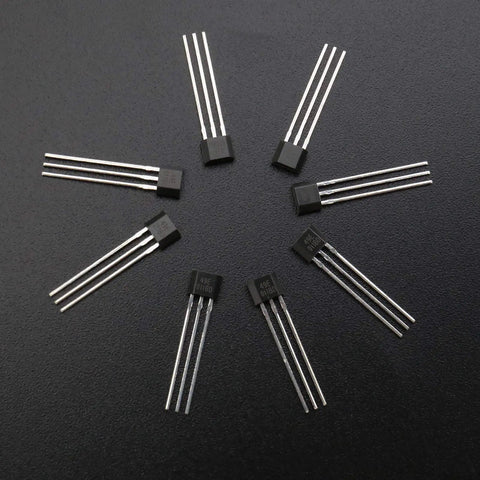 Array of 49E OH49E S49E SS49E Linear Hall Effect Sensor TO92 Package with three terminal pins on a black background