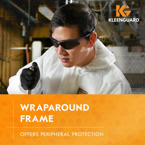 Person wearing white protective suit and V30 Nemesis Polarized Safety Glasses Smoke Gray Lenses Gunmetal Frame Unisex Sunglasses.