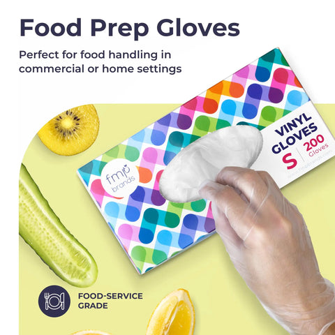 Hand pulling glove from box of Ambidextrous 200 Pack Disposable Vinyl Gloves For Meal Prep And Kitchen Cleaning Large Size