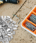 Pile of metal strapping clips beside a container of screws on concrete, Heavy Duty Steel Strapping Clip With Iron Buckle For Industrial Packaging