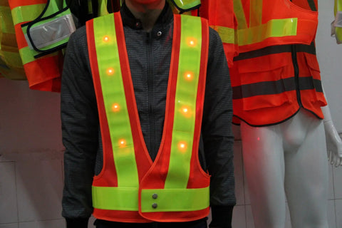 Keep It Lit And Stay Fly On The Streets With This Fresh 16 Led Reflective Safety Vest on a person, showcasing bright LEDs and reflective strips.