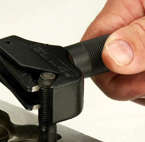 External And Internal Thread Restorer Kit For Inches And Metric Threads Five Thirty Second To Eleven Sixteenth External Capacity And Five Sixteenth To Thirteen Sixteenth Internal Capacity One Hand Tool Rebuilds Fine To Coarse Fasteners in use, showing adjustment of tool handle.