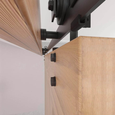 Close-up of 8FT Barn Door Hardware Kit with Heavy Duty Sliding Track, showing J Shaped Carbon Steel System installed on wooden door panel.