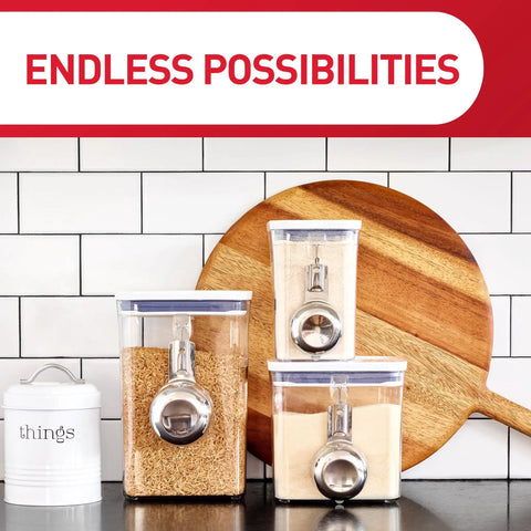 Kitchen counter with three stacked clear storage containers, wooden cutting board, and "Endless Possibilities" text above.