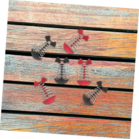 Heavy Duty Adjustable Aluminum Fishbone Tent Pegs And Rope Tighteners For No Sweat Awning Setup Lightweight Camping Ground Stakes And Tent Anchors Black And Red displayed on wooden surface.