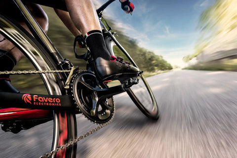 Cyclist using Assioma Duo Power Meter Pedal System With Rechargeable Batteries Delivers 50 Hours Of Ride Power on road bike