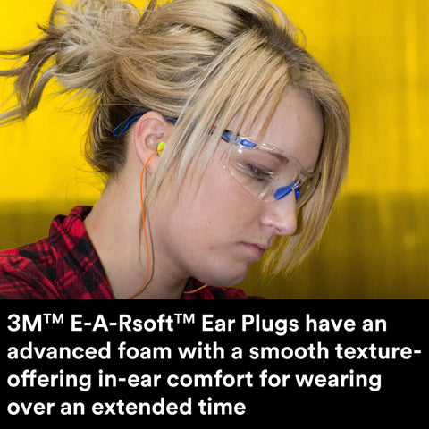 Person wearing protective glasses and corded E A Rsoft FX 312-1260 Disposable Foam Ear Plugs, NRR 33 for noise reduction.