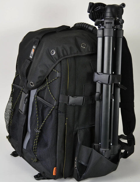Side view of Large Camera Backpack With Padded Dividers, 16 Inch Laptop Compartment, tripod attached, adjustable straps visible.