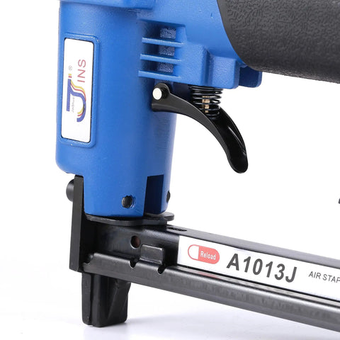 Close-up of Heavy Duty 14 Gauge Brad Nailer With Touch Strike Safety adjustable trigger and loading mechanism for woodworking tasks.