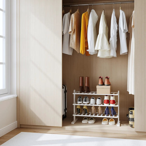 White Bamboo Shoe Rack Organizer For Closet And Entryway Free Standing Three Tier Wooden Shoe Shelf For Tight Spaces in a closet.