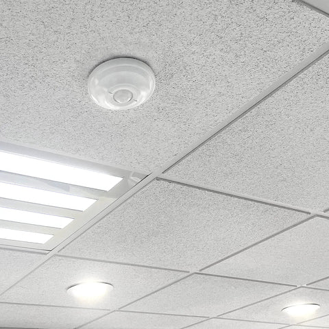 Ceiling Mount 360 Degree PIR Occupancy Sensor For Indoor Lighting installed on ceiling, hard wired motion sensor, compatible with LEDs, 120-277V.