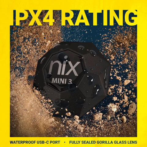 Portable Color Sensor And Color Matcher Tool With 300000 Plus Paint Library For Instant RGB Hex And CMYK Values Dust Debris And Splash Resistant IPX4 So You Can Quick Match Paint On Any Surface Like A Pro against sand and debris background.