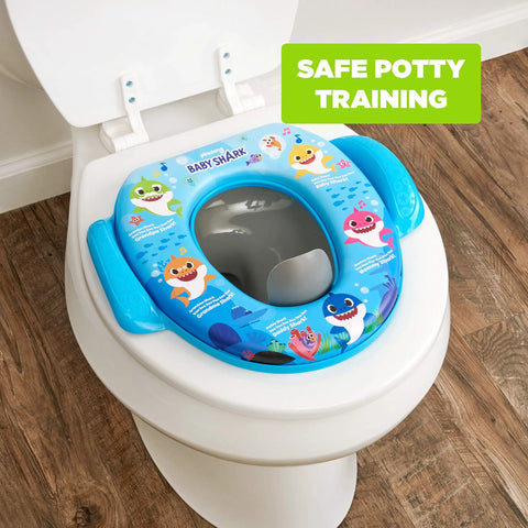 Baby Shark Soft Potty Training Seat With Hella Comfy Cushion And Secure Grip Handles Smooth Bathroom Transition For Toddlers Durable Non Slip Platform Easy To Clean on a toilet.