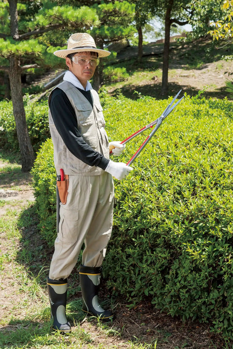 Gardener using Pro Grade Hedge Shears With Ultra Sharp Steel Blades, Adjustable Pivot Bolt For Precise Cuts on shrubs