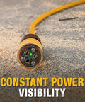 50 Foot Lighted Extension Cord With Click To Lock Locking Plug 10/3 SJTW on workshop floor with illuminated plug