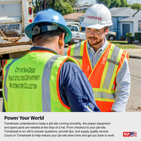Two men in safety vests and hard hats discussing on a work site, one vest labeled 'City of San Diego Public Utilities Department'.