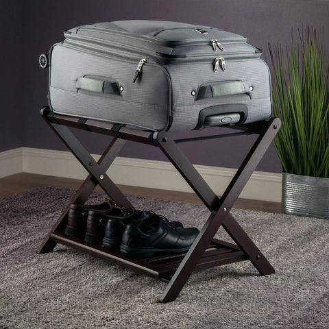 Heavy Duty Foldable Luggage Rack Holds All Your Travel Bags With A Hella Sturdy Frame And A Fresh Cappuccino Finish, showcasing a suitcase and shoes.