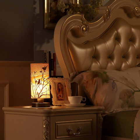 Birds In A Tree Wood Table Lamp With Wood Lampshade And Bronze Metal Base on bedside table, cozy vintage night light.