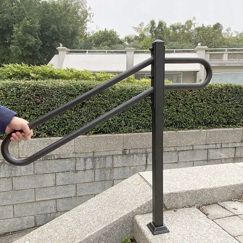 Tough As Nails Outdoor Single Post Wrought Iron Stair Rail For 1 To 3 Steps, installed on stone steps, side view.