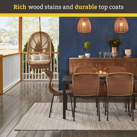 Outdoor patio with wicker furniture and wood finish featuring Australian Timber Oil Wood Stain And Protector Jarrah Brown Finish.