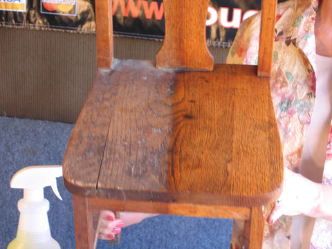 Chair half-polished with Beeswax Wood Polish And Restorer Bundle For Hardwood Floors, showing shiny restored and dull sides