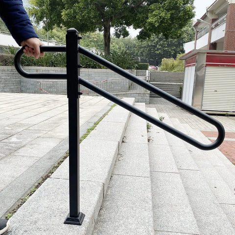 Tough As Nails Outdoor Single Post Wrought Iron Stair Rail For 1 To 3 Steps installed on concrete steps outdoors