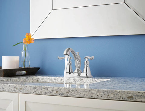 Linden Centerset Chrome Bathroom Faucet With Diamond Seal Technology And Metal Drain installed on granite vanity