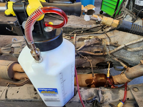 ATF Sealed Fluid Extractor And Refill Kit For Auto Trans Fluids, 2.5 Gallon Capacity with flex hose and control valve in use