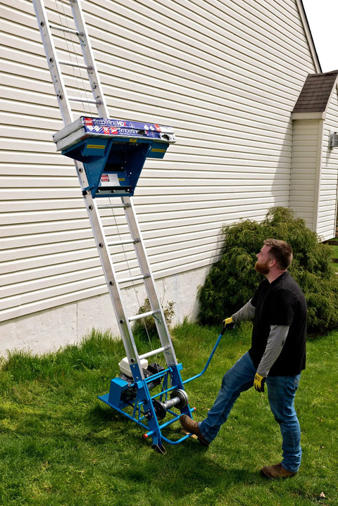 Pro Grade Gas Material Hoist 300 Lb Capacity Roof Lift with extendable track system, used for moving materials to steep roofs.