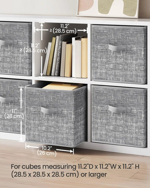 Rock Solid Foldable Storage Cubes Set Of 6, Durable 11 Inch Closet Organizers With Reinforced Handles in a shelving unit.