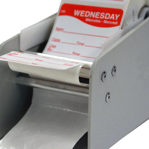 Heavy Hitter Plastic Label Dispenser Rack For Single Two Inch Wide Roll showing red and white labels ready for use.