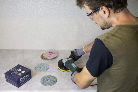 Man using 5 Inch Diamond Polishing Pads Wet Dry Set for Marble Quartz Granite Concrete, 8 Piece Kit on countertop