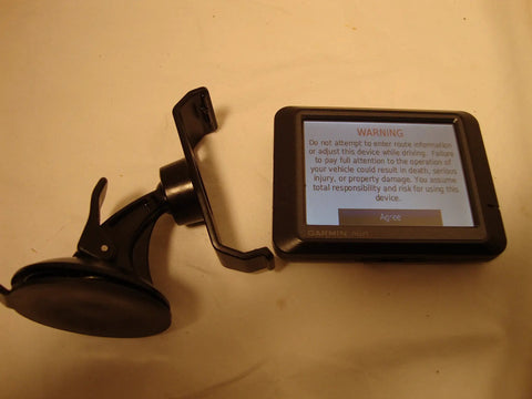 Nuvi 265 265T 3.5 Inch Bluetooth Portable GPS Navigator with mount, displaying warning screen.