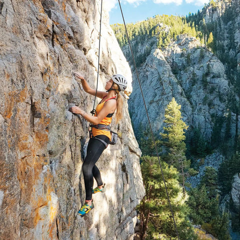 Top Shelf Heavy Duty Braided Polyester Arborist Rope Half Inch By 120 Feet used for climbing on rocky surface outdoors.