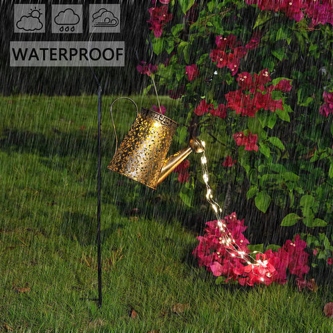 Solar Watering Can Lights Outdoor Garden Decor Large Waterproof Cascading LED Hanging Lights With Copper Wire in rain by flowers