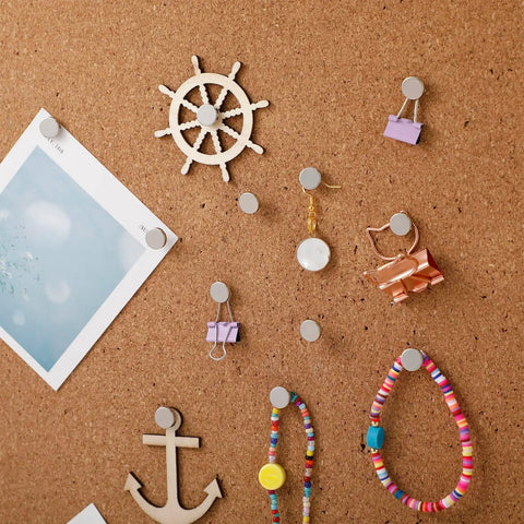 Built Tough Silver Metal Push Pins And Straight Shooting Thumb Tacks For Bulletin Boards Smooth Wall Mounting Heavy Duty Picture Hangers Compact Go To Office Supplies 30 Piece Set display on corkboard with various items.